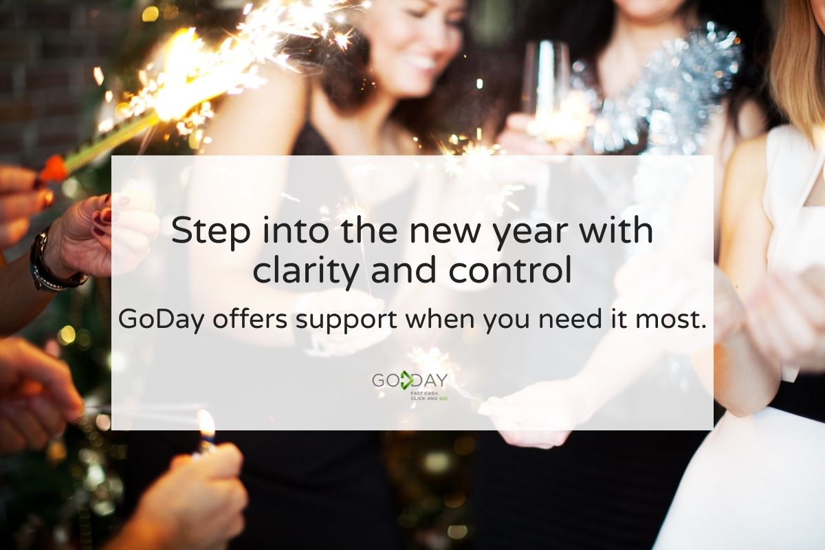 People celebrating with sparklers during a New Year gathering, representing GoDay’s message about entering the new year with financial clarity and support.