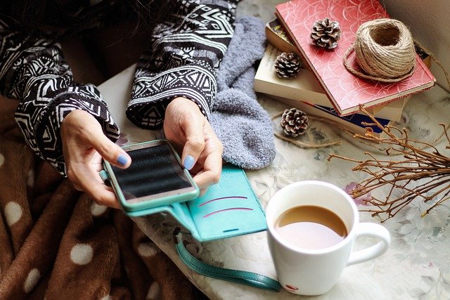 online payday loans woman with cellphone